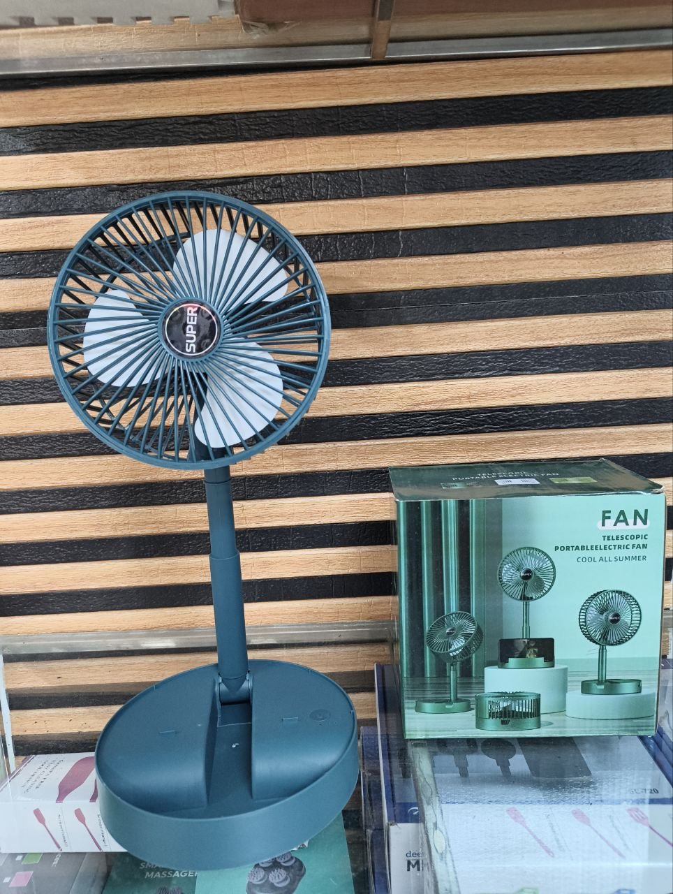 1000124640.jpg TELESCOPIC PORTABLEELECTRIC FAN - Image 1